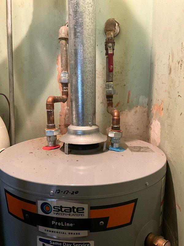 Responded to service call for water heater that would not stay lit. Upon arrival, inspected State ProLine commercial grade water heater installed in basement utility area. Diagnosed faulty Resideo gas control valve (model WV8840B1158) that was preventing pilot from remaining lit. Replaced defective gas control valve with new unit, tested for proper gas flow and pressure, verified pilot ignition and flame stability, and confirmed burner operation through complete heating cycle. Water heater restored to full operational status.