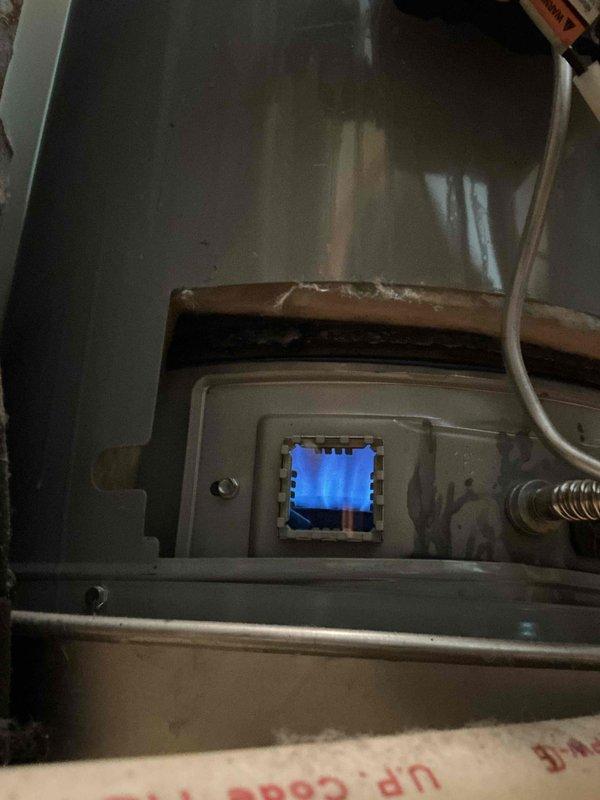 Responded to callback for gas water heater that was inadvertently left in the off position following previous service visit. Upon arrival, verified unit was not operating and pilot light was extinguished. Relit pilot light, turned gas control valve to on position, and verified proper ignition of main burner. Confirmed blue flame pattern through viewing window indicating correct combustion. Verified unit returned to normal heating operation with no issues.