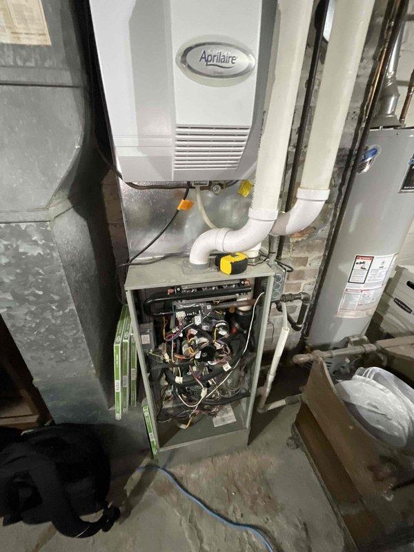 Conducted sales estimate for new air conditioning system installation in residence with no existing AC equipment. Assessed basement furnace location and existing HVAC infrastructure including Aprilaire humidification system to determine optimal equipment placement and ductwork modifications required for complete cooling system integration with evaporator coil installation.