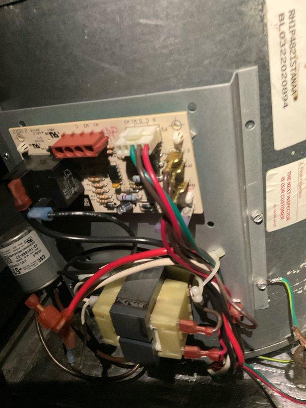 Responded to no-cooling complaint after previous contractor suggested circuit breaker issue. Performed diagnostic inspection of AC system and electrical components. Inspected control board, transformer, capacitor, and relay connections within air handler cabinet. Verified proper voltage at transformer and control circuits. Checked all wire terminations at terminal blocks and confirmed secure connections. Inspected blower assembly and control panel for any visible damage or failed components. System operational at time of inspection with all electrical components functioning within normal parameters.
