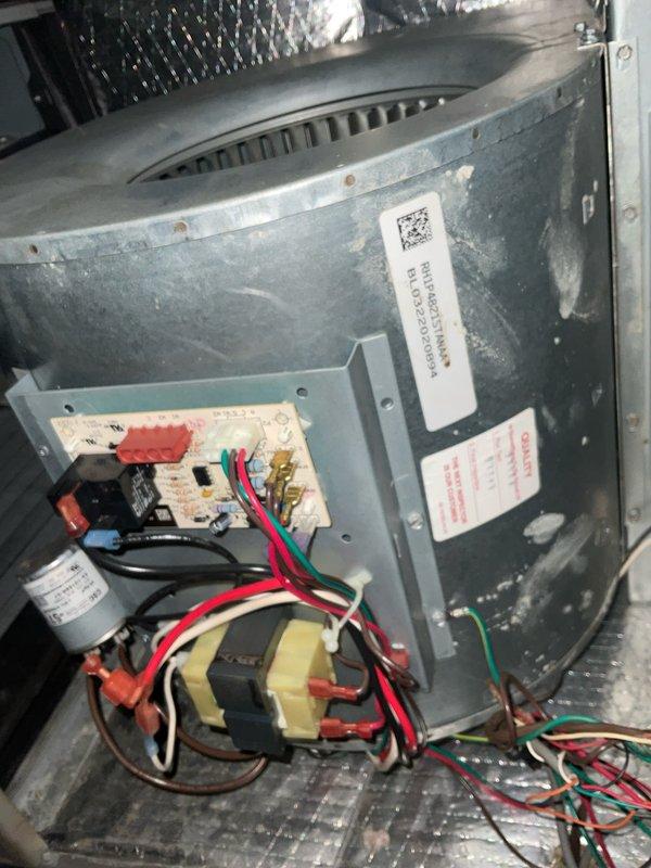 Responded to no-cooling complaint after previous contractor suggested circuit breaker issue. Performed diagnostic inspection of AC system and electrical components. Inspected control board, transformer, capacitor, and relay connections within air handler cabinet. Verified proper voltage at transformer and control circuits. Checked all wire terminations at terminal blocks and confirmed secure connections. Inspected blower assembly and control panel for any visible damage or failed components. System operational at time of inspection with all electrical components functioning within normal parameters.