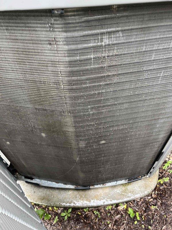 Completed comprehensive BFMA tune-up service on 9+ year old outdoor AC unit. Performed full system inspection, cleaned condenser coils showing moderate dirt and debris accumulation, checked refrigerant levels, tested electrical components, verified proper airflow through fin assembly, and ensured unit operational efficiency. Equipment running within normal parameters upon completion.