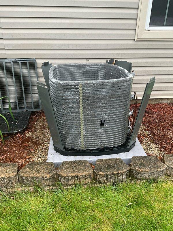 Performed comprehensive BFMA tune-up service on Trane residential air conditioning system. Completed full system inspection, removed front access panel to expose condenser coil which showed moderate dust and debris accumulation between fins, cleaned coil surfaces, verified unit operation, and restored all panels. System operating within normal parameters upon completion.