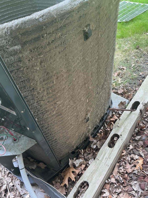Completed comprehensive BFMA tune-up on 12+ year old residential air conditioning system. Thoroughly cleaned heavily soiled condenser unit with significant dirt, dust, and organic debris accumulation on coils and fins that was restricting airflow and reducing system efficiency. Performed standard maintenance procedures including system inspection, operational testing, and documentation of equipment condition with photographic records.