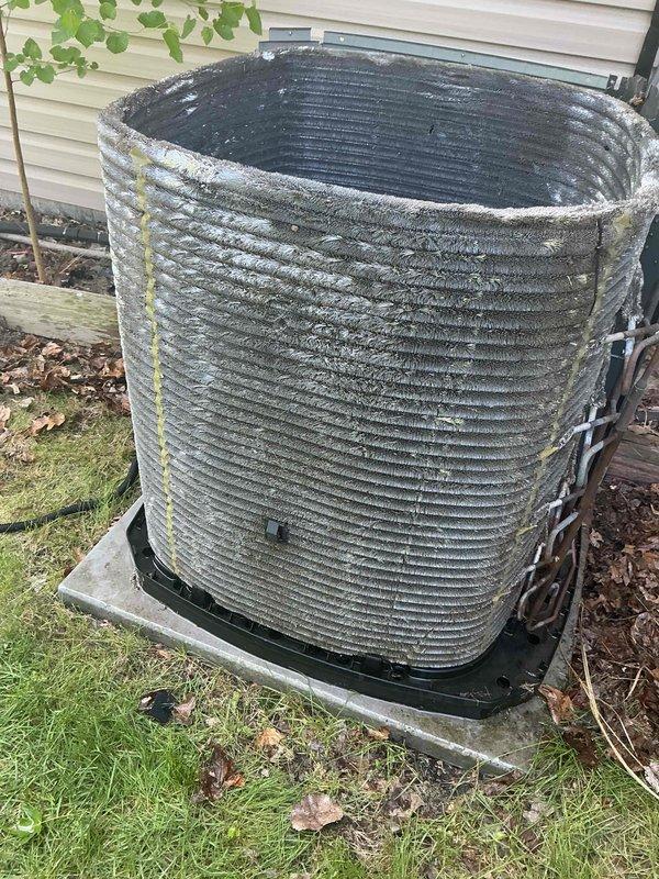Completed comprehensive BFMA tune-up on 12+ year old residential air conditioning system. Thoroughly cleaned heavily soiled condenser unit with significant dirt, dust, and organic debris accumulation on coils and fins that was restricting airflow and reducing system efficiency. Performed standard maintenance procedures including system inspection, operational testing, and documentation of equipment condition with photographic records.