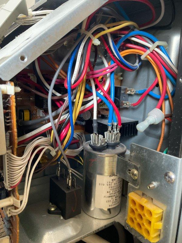 Completed comprehensive tune-up service on wall-mounted mini-split air conditioning system. Performed full system inspection including electrical components, capacitor testing, wiring connections, and control board evaluation. All components found to be in proper working condition with secure wire connections and functioning capacitor. Cleaned unit exterior, verified proper operation of all controls and display functions, and confirmed system is operating within manufacturer specifications.