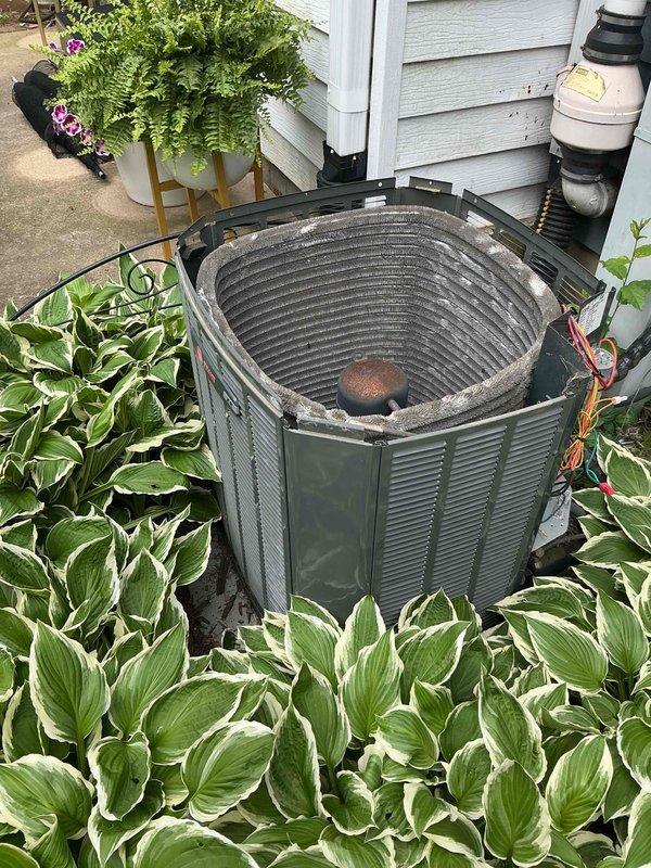 Completed comprehensive BFMA tune-up service on 8+ year old Trane cylindrical condenser unit. Performed standard maintenance procedures including inspection of condenser coils which showed dirt and dust accumulation, checked refrigerant levels, tested electrical components and connections, verified proper airflow through vertical louvers, and ensured condensate drain system functionality. Unit operational upon completion with all components functioning within manufacturer specifications.