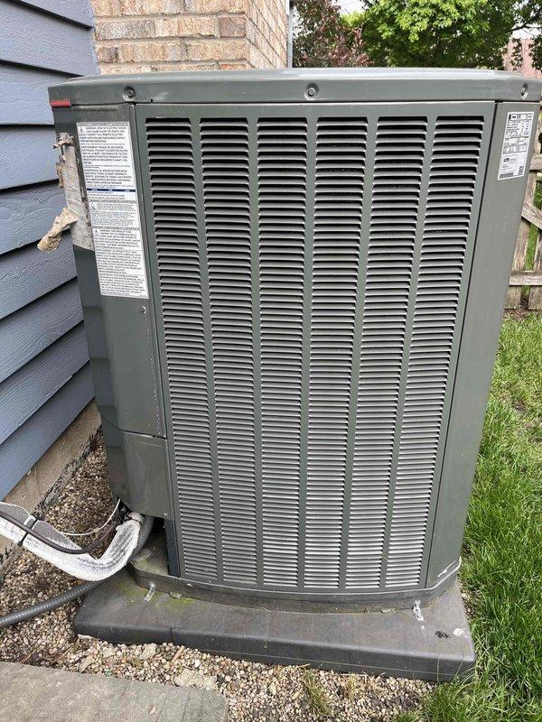 Completed comprehensive BFMA tune-up service on residential air conditioning system over 5 years old during morning appointment window. Performed standard maintenance protocol including inspection of outdoor condenser unit with louvered casing, verified proper operation of all components, and assessed ductwork condition in attic space. Noted presence of debris accumulation near flexible ductwork but system operating within normal parameters; all refrigerant lines and connections secure with proper insulation intact.