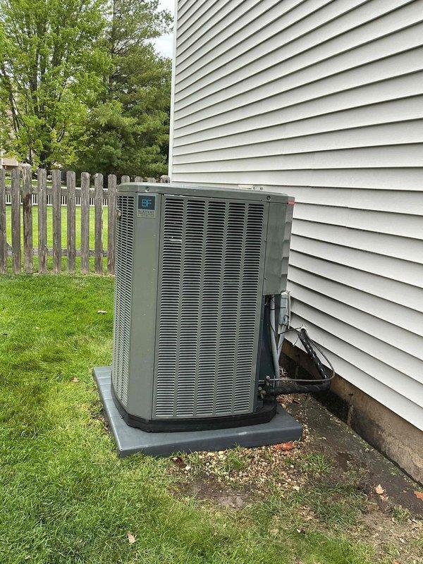 Completed comprehensive BFMA tune-up on residential air conditioning system with 7-year-old outdoor condensing unit. Unit exterior showed significant accumulation of dirt, debris, and biological growth on condenser coils and protective grilles, which was cleaned to restore proper airflow and heat transfer efficiency. Performed full preventive maintenance inspection including refrigerant line assessment, electrical connections verification, and clearing of organic debris from unit base and surrounding area to ensure optimal system performance.