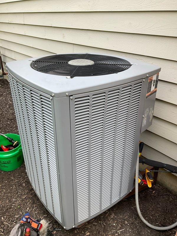 Completed comprehensive air conditioning tune-up on 18-year-old system. Inspected and serviced outdoor condensing unit, verified proper operation of condenser fan and compressor, checked refrigerant levels, and cleaned coils. Inspected indoor air handler, confirmed air filter condition and proper airflow through pleated media filter, and tested system controls for optimal cooling performance.