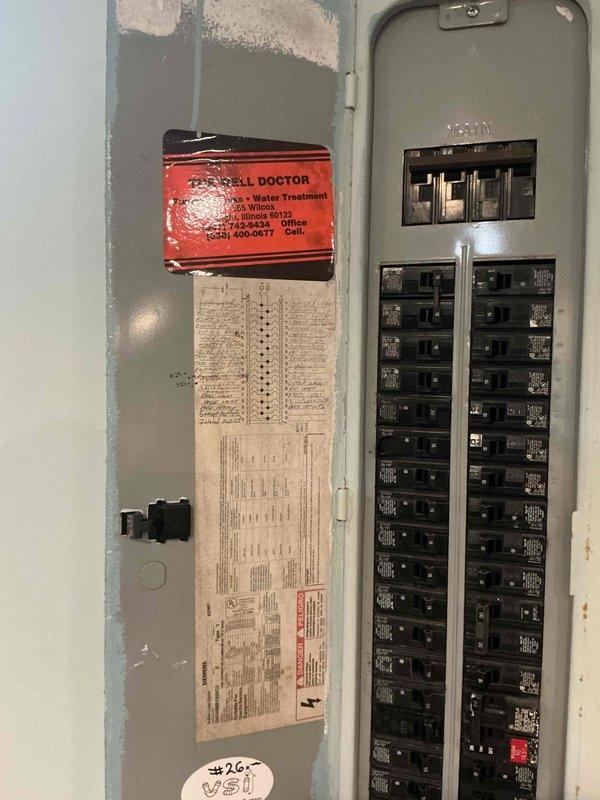 Responded to no-cooling complaint with AC line freezing and ice buildup on refrigerant lines. Performed diagnostic evaluation on 12-year-old system and identified low R22 refrigerant charge as primary cause of freeze-up condition. Completed comprehensive AC tune-up service including system inspection of furnace unit, electrical panel verification, and assessment of overall HVAC infrastructure in basement utility area. Provided estimate for A/C and coil replacement due to age of equipment and R22 refrigerant phase-out considerations. Discussed humidifier addition options for future membership inclusion.