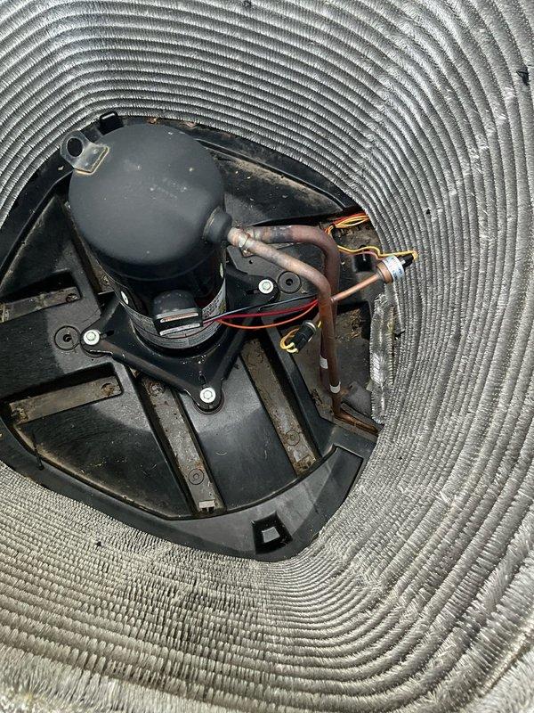 Responded to call back following preventive maintenance to address leaves that were missed during initial cleaning. Removed debris from condenser base pan and verified unit was clear of obstructions. Inspected compressor assembly and refrigerant lines to ensure proper operation and cleanliness of all components within the condenser section.