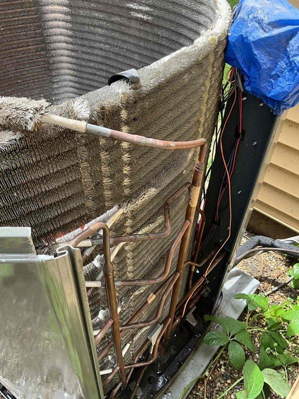 Completed comprehensive BFMA tune-up on 7+ year old air conditioning system. Upon arrival, outdoor condenser unit exhibited heavy accumulation of dust, dirt, and debris throughout coil fins and exterior surfaces. Performed thorough coil cleaning to remove substantial buildup that was restricting airflow and reducing heat transfer efficiency. Inspected copper refrigerant lines, electrical connections, and mounting hardware. Replaced air filter, verified proper system operation, and documented pre- and post-service conditions with photographs.