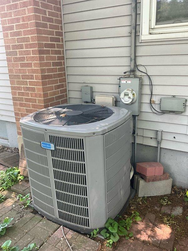 Completed comprehensive BFMA tune-up service on a 6-year-old residential air conditioning system. Performed standard maintenance procedures including inspection of outdoor condenser unit, verification of electrical connections at disconnect and meter assembly, assessment of coil condition, and documentation of equipment status. Notable observations include visible rust and corrosion on condenser exterior surfaces, indicating normal weathering for unit age, though all components remain operational and system is functioning within manufacturer specifications.