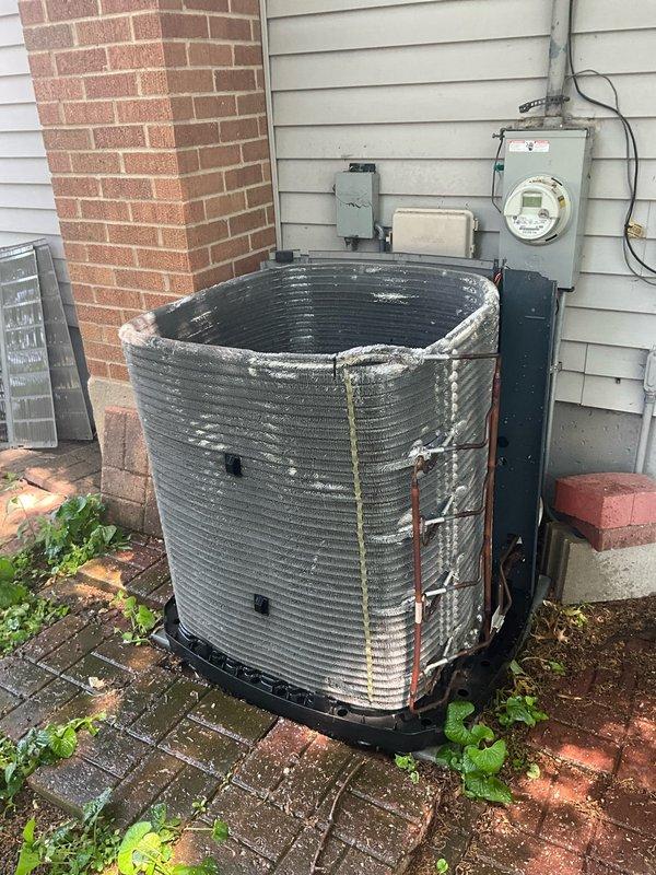 Completed comprehensive BFMA tune-up service on a 6-year-old residential air conditioning system. Performed standard maintenance procedures including inspection of outdoor condenser unit, verification of electrical connections at disconnect and meter assembly, assessment of coil condition, and documentation of equipment status. Notable observations include visible rust and corrosion on condenser exterior surfaces, indicating normal weathering for unit age, though all components remain operational and system is functioning within manufacturer specifications.
