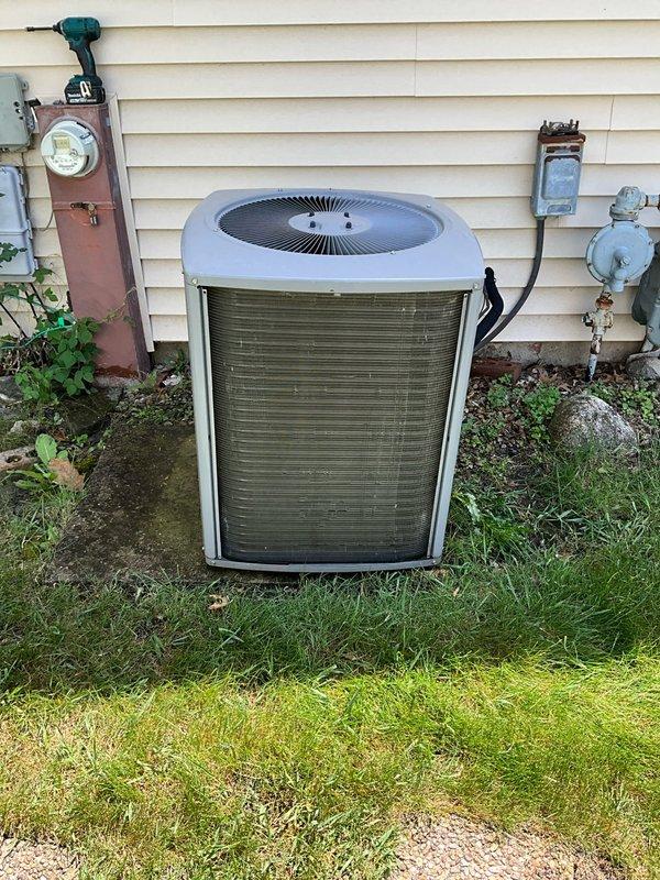 Performed comprehensive BFMA tune-up on residential air conditioning system aged 3+ years. Completed full inspection of outdoor condenser unit, verified proper operation of compressor and fan motor, checked refrigerant lines and electrical connections at disconnect box, and ensured all components were functioning within manufacturer specifications. System tested successfully with no issues identified during maintenance visit.