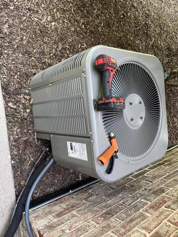 # HVAC Maintenance - BFMA Tune Up

Performed comprehensive annual tune-up on residential air conditioning system during morning service window. Upon arrival, conducted visual inspection of outdoor condensing unit and documented equipment age and model information for service records.

## Condenser Unit Service

Inspected outdoor condensing unit and found condenser coils heavily contaminated with dirt, dust, lint, and environmental debris causing significant airflow restriction. Multiple fin sections showed bending, compression, and deterioration from lack of previous maintenance. Removed access panels and performed thorough cleaning of condenser coil assembly using appropriate cleaning solutions and equipment. Carefully straightened bent fins where possible to restore proper airflow patterns. Removed accumulated debris from between fin sections and around unit perimeter.

## System Inspection and Testing

Verified proper operation of condenser fan motor and assessed fan blade condition