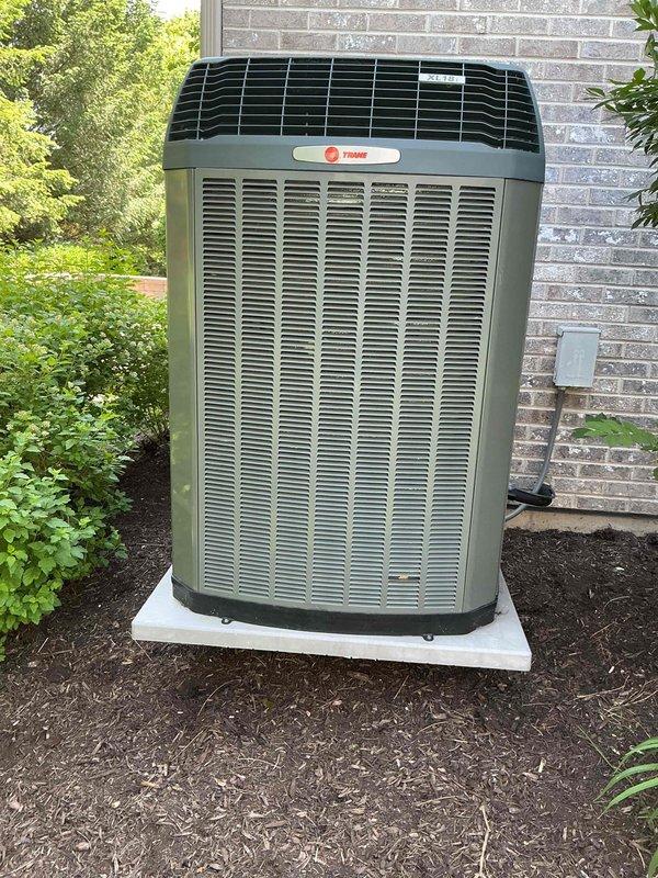 Responded to callback for real-time refrigerant measurements on Trane outdoor condensing unit. Accessed unit and obtained current Fieldpiece readings for side 1 refrigerant system to verify 2025 measurements and system performance. Documented findings with photos of internal components and overall unit condition.