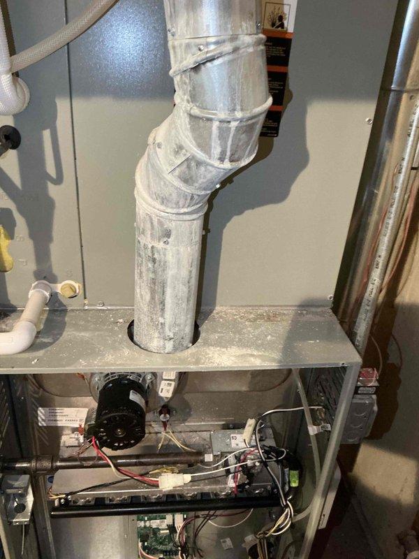 Completed comprehensive BFMA tune-up service on 14-year-old air conditioning system. Performed thorough inspection of all major components including blower motor assembly, electrical connections, control board with digital display interface, and ductwork system. Verified proper operation of electronic controls, cleaned accumulated dust and debris from interior components and metal platform surfaces, checked all wiring harnesses and connections for secure fit and proper condition, and inspected copper refrigerant lines and PVC condensate drainage. System tested and confirmed operating within normal parameters upon completion of preventive maintenance procedures.