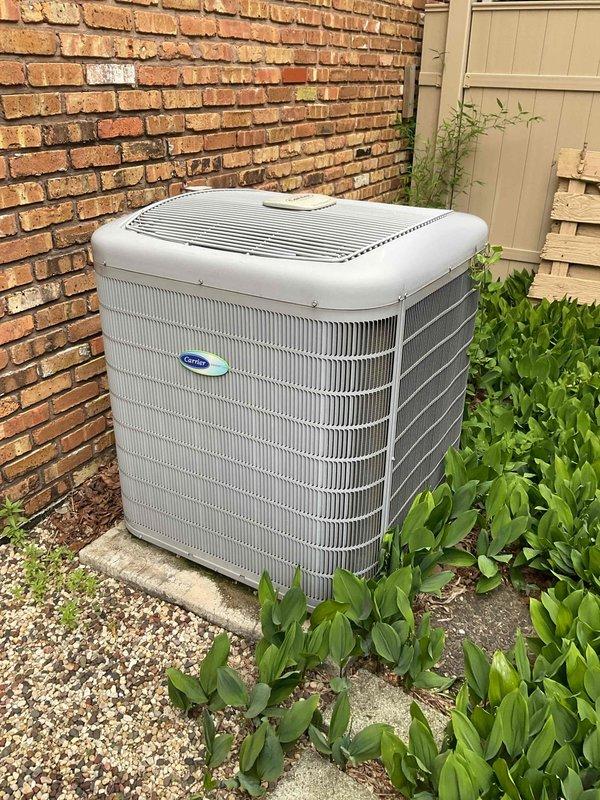 Completed comprehensive BFMA tune-up on an 11-year-old Carrier air conditioning system. Performed standard maintenance protocol including inspection of outdoor condenser unit, verification of proper airflow through coil sections, and assessment of air filtration system. Inspected pleated air filter showing moderate dust accumulation consistent with normal operation, verified unit integrity and proper positioning on concrete pad with adequate clearance from surrounding landscaping.