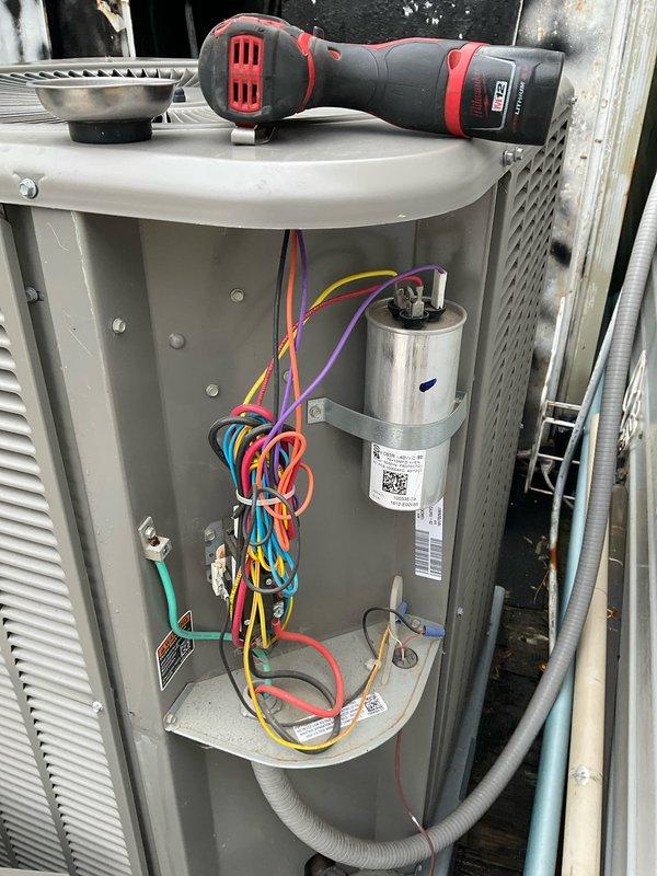Completed comprehensive BFMA tune-up service on an 8-year-old air conditioning system during scheduled morning appointment. Performed detailed inspection of condenser unit, noting significant exterior weathering and paint deterioration on metal panels, though internal components including capacitor, motor assembly, and electrical connections were found in functional condition. Inspected all wiring harnesses, verified proper electrical connections across multiple circuits, and assessed overall system operation to ensure continued reliability of the unit.