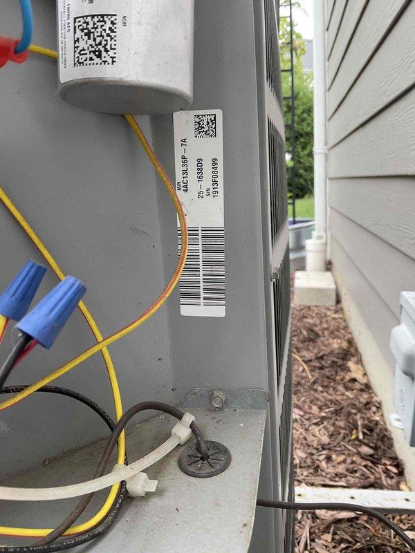 Completed comprehensive air conditioning tune-up on 12+ year old outdoor unit, including inspection of electrical connections, capacitor, and control components. All wire connections were secure with proper wire nuts in place, and equipment identification labels were verified. System operational and ready for continued service.