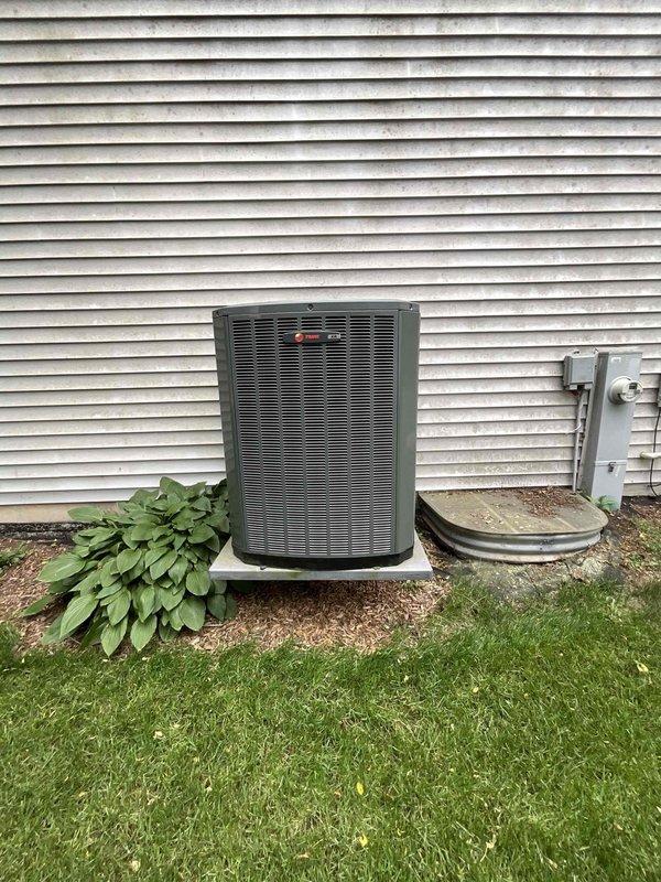 Completed comprehensive BFMA tune-up service on 9+ year old Trane air conditioning system. Performed standard maintenance protocol including inspection of outdoor condenser unit, verified proper clearances and airflow around equipment, cleaned and assessed air filter which showed moderate dust accumulation, and evaluated overall system operation. All components inspected and system found to be functioning within normal parameters.
