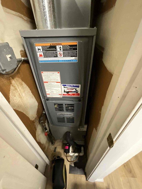 Completed comprehensive BFMA tune-up service on a 7+ year old residential HVAC system. Performed complete air conditioning system inspection and maintenance on outdoor condenser unit, including cleaning, testing operational efficiency, and verifying proper refrigerant levels. Inspected indoor furnace unit located in utility closet, checked electrical connections, verified safety controls, and ensured all components were functioning within manufacturer specifications.