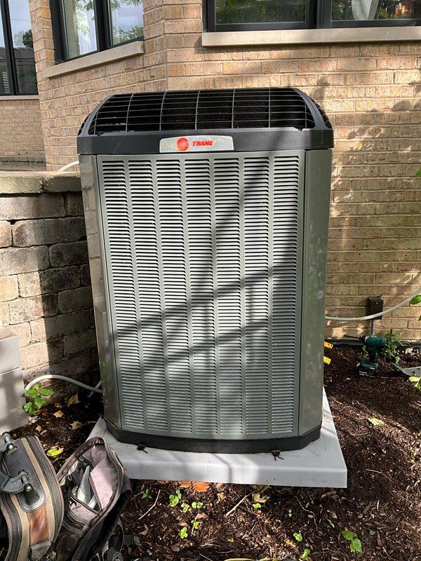 Completed comprehensive BFMA tune-up service on Trane outdoor condensing unit aged 1+ years. Performed standard preventive maintenance procedures including system inspection, cleaning of condenser coils, verification of refrigerant pressures, electrical connection testing, and operational performance assessment. Unit operating within manufacturer specifications upon completion, with replacement air filters staged for installation.