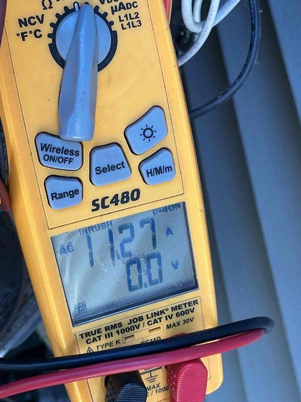 Completed comprehensive BFMA tune-up service on 5-year-old air conditioning system. Performed full system inspection, tested capacitor functionality and electrical connections, measured amperage draw at 11.27 amps confirming proper compressor operation, cleaned accumulated debris from capacitor and internal components, verified all electrical terminals and wiring harnesses were secure, and conducted multi-point safety inspection. System operating within manufacturer specifications with no deficiencies noted.