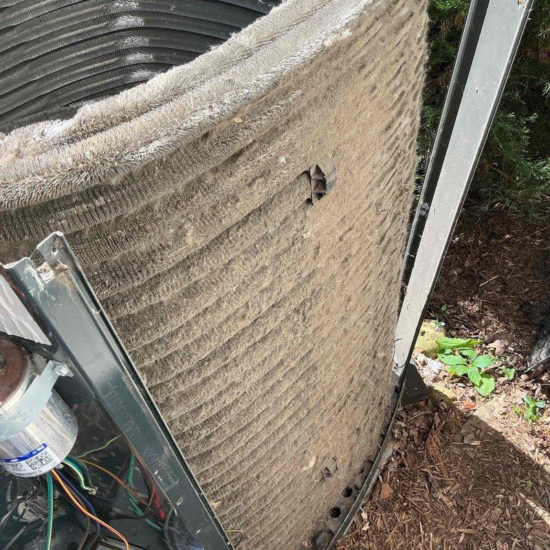 Completed comprehensive BFMA tune-up on 8-year-old air conditioning system. Upon inspection, discovered condenser coils heavily clogged with dirt, dust, and debris accumulation, significantly restricting airflow and reducing system efficiency. Thoroughly cleaned and serviced all accessible components, including evaporator and condenser coils, to restore optimal performance and airflow capacity.