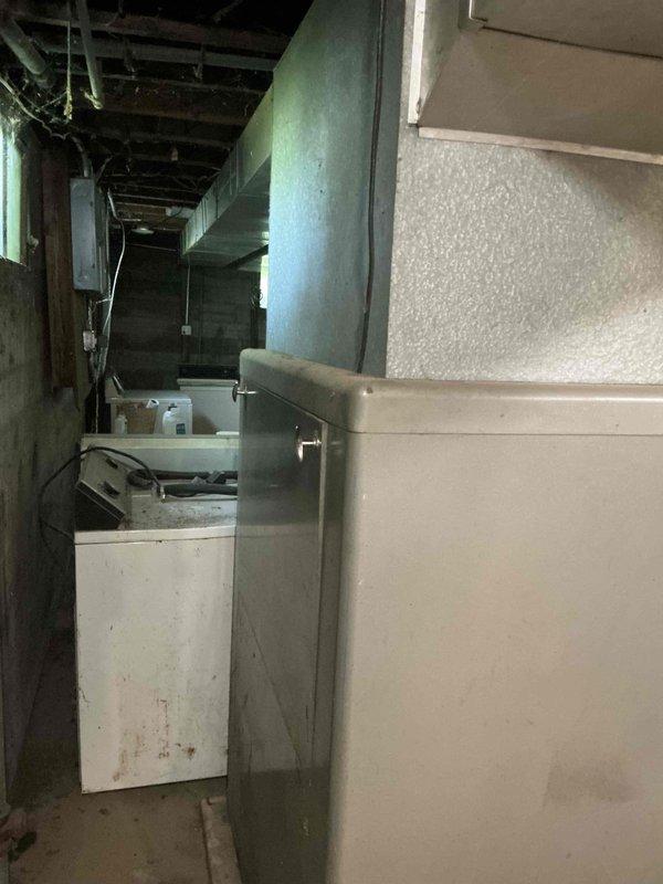 Conducted on-site assessment for furnace replacement in residential property. Evaluated existing heating system, an antiquated 60-70+ year old converted coal burner unit located in basement utility area. Documented current equipment condition, surrounding mechanical infrastructure, electrical panel configuration, and existing ductwork layout. Photographed installation area to develop accurate replacement specifications and identify any necessary modifications to accommodate modern high-efficiency furnace equipment.