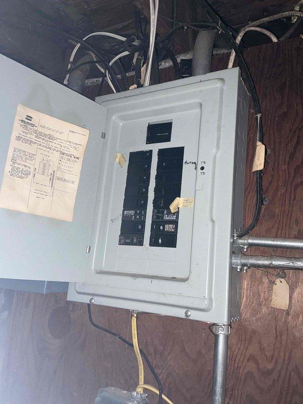 Conducted on-site assessment for furnace replacement in residential property. Evaluated existing heating system, an antiquated 60-70+ year old converted coal burner unit located in basement utility area. Documented current equipment condition, surrounding mechanical infrastructure, electrical panel configuration, and existing ductwork layout. Photographed installation area to develop accurate replacement specifications and identify any necessary modifications to accommodate modern high-efficiency furnace equipment.