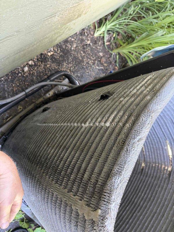 Completed comprehensive BFMA tune-up on residential air conditioning system. Performed exterior inspection of condenser unit, noting accumulated dirt and debris within coil fins; cleaned and cleared obstructions to restore proper airflow. Inspected and replaced heavily soiled pleated air filter showing significant dust accumulation and discoloration, which was restricting system airflow and reducing efficiency. Verified electrical connections, refrigerant lines, and overall unit operation to ensure system is functioning within manufacturer specifications for the cooling season.