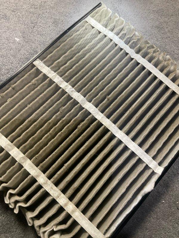 Completed comprehensive BFMA tune-up on residential air conditioning system. Performed exterior inspection of condenser unit, noting accumulated dirt and debris within coil fins; cleaned and cleared obstructions to restore proper airflow. Inspected and replaced heavily soiled pleated air filter showing significant dust accumulation and discoloration, which was restricting system airflow and reducing efficiency. Verified electrical connections, refrigerant lines, and overall unit operation to ensure system is functioning within manufacturer specifications for the cooling season.