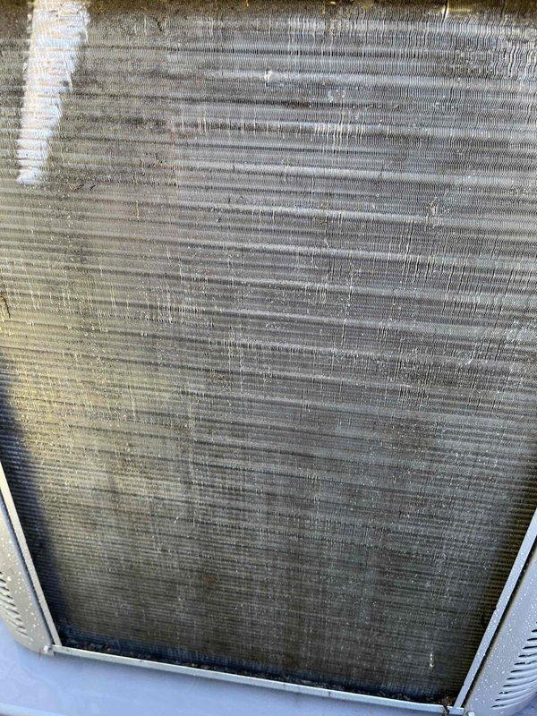 Completed comprehensive BFMA tune-up service on Lennox outdoor condensing unit. Inspected evaporator coil and identified significant accumulation of dirt, dust, and debris between fins, which was reducing system efficiency and airflow. Performed thorough cleaning of condenser coils to remove buildup, checked refrigerant levels, verified electrical connections, and tested system operation to ensure optimal performance.