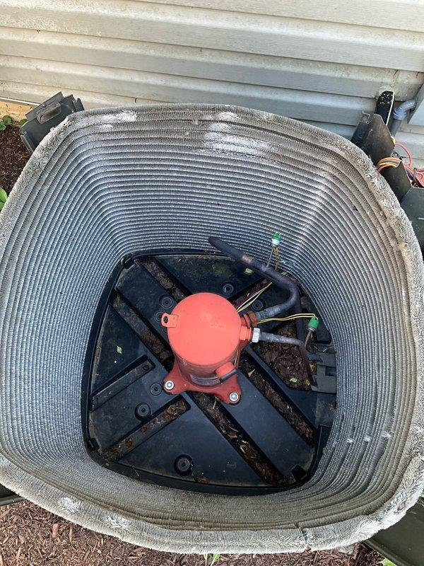 Completed comprehensive BFMA tune-up service on 14+ year old air conditioning system. Performed standard maintenance protocol including inspection of outdoor condenser unit, verified electrical connections, assessed condenser coil condition with visible debris accumulation between fins, and replaced air filter. System operational upon completion with recommendations provided for ongoing maintenance due to equipment age.