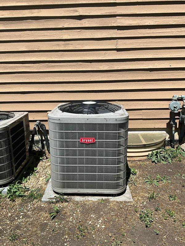 Technician returned to residential property to inspect for refrigerant leak using UV dye previously injected into the system. Performed thorough examination of Bryant model 126BNA036-A air conditioning system (S/N 5017E14937) utilizing R-410A refrigerant. Conducted complete AC tune-up service including visual inspection of condenser unit, verification of electrical specifications (208-230V, 1-phase, 60Hz), and system performance evaluation. Documented equipment specifications and outdoor installation condition. No active leaks detected during dye inspection. System operating within manufacturer specifications with compressor drawing 14.1 RLA and proper refrigerant charge of 6.75 lbs maintained. All components functioning properly upon completion of service visit.