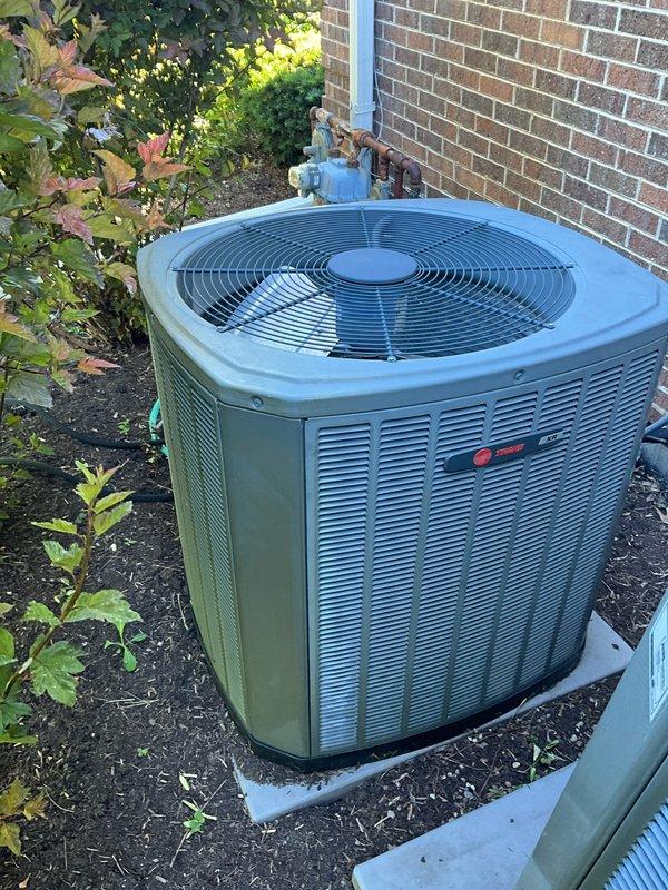Completed comprehensive BFMA tune-up service on three systems including two standard air conditioning units and one mini-split system. Performed thorough inspection and maintenance procedures on both outdoor condenser units, which included a Trane system and a cylindrical model, verifying proper operation, refrigerant line integrity, adequate clearances, and overall system performance. All equipment found to be in good working condition with proper airflow and secure mounting.