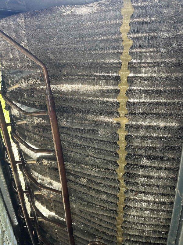 Completed comprehensive BFMA air conditioning tune-up service including full system inspection and performance evaluation. Inspected and documented air filter condition, finding pleated filter clean with no visible dust accumulation or discoloration. Examined HVAC ductwork and refrigerant line installation in attic space, noting flexible aluminum ductwork with insulation sealing and copper refrigerant lines properly routed throughout system.