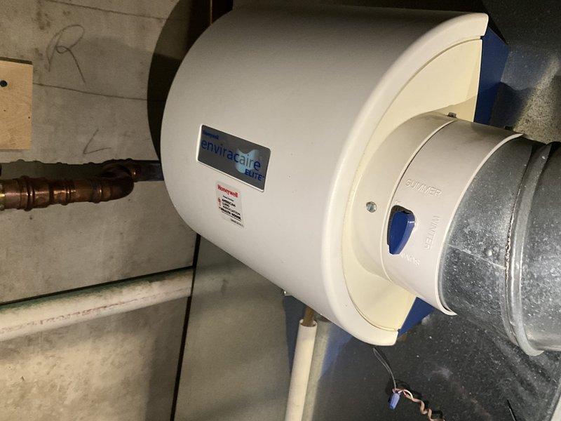 Completed comprehensive tune-up service on two residential air conditioning systems, both over 21 years old. Performed standard maintenance procedures including inspection of condenser units, verification of refrigerant levels, electrical connection testing, and system performance evaluation. Also inspected humidifier unit mounted to ductwork in mechanical room, confirmed proper operation and settings for seasonal adjustment.