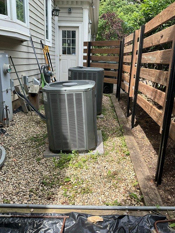Completed comprehensive tune-up service on two residential air conditioning systems, both over 21 years old. Performed standard maintenance procedures including inspection of condenser units, verification of refrigerant levels, electrical connection testing, and system performance evaluation. Also inspected humidifier unit mounted to ductwork in mechanical room, confirmed proper operation and settings for seasonal adjustment.