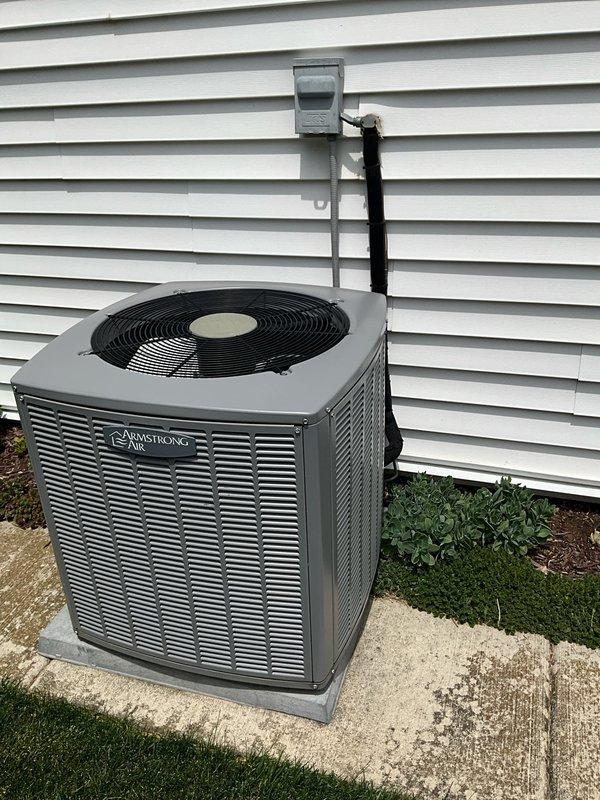 Completed comprehensive BFMA tune-up service on Armstrong Air outdoor condensing unit. Performed full system inspection, cleaned condenser coils, verified proper refrigerant pressures, tested electrical components, and confirmed optimal airflow through heat exchanger fins. Unit operating within manufacturer specifications with all safety controls functioning properly.
