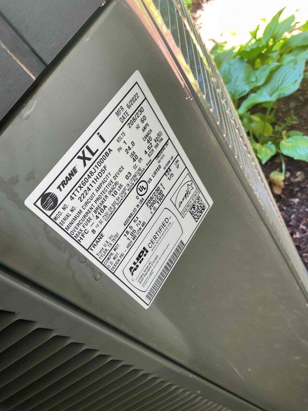 Completed comprehensive BFMA tune-up service on a Trane XL outdoor condensing unit aged 3+ years. Performed full preventive maintenance protocol including inspection of condenser coil (noted weathering and mineral deposits on fins), verified electrical connections and conduit, checked refrigerant levels, tested system operation, and documented equipment condition with photos. Unit operational and ready for continued service.