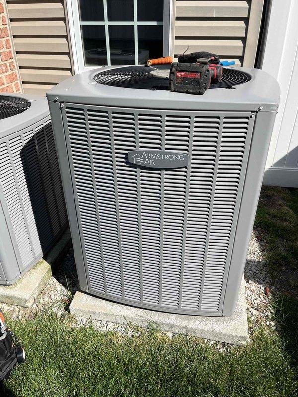Completed comprehensive BFMA tune-up service on two Armstrong Air air conditioning systems, both approximately 4 years old. Performed thorough inspection of both outdoor condenser units, noting significant accumulation of dirt, dust, and debris throughout the condenser coil fins on one unit that required cleaning to restore optimal heat exchange efficiency. Conducted standard maintenance protocol including system performance testing, electrical connection verification, and refrigerant line inspection to ensure proper operation of both units for the cooling season.