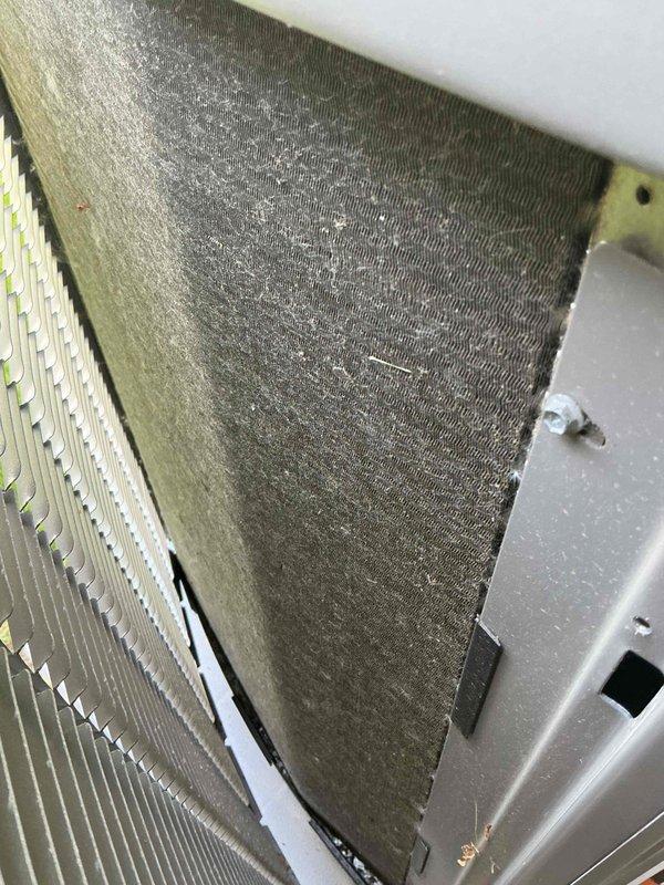 Completed comprehensive BFMA tune-up service on residential air conditioning system. Performed full system inspection and maintenance protocol including evaluation of evaporator coil assembly and outdoor condenser unit. Both air filters showed significant accumulation of dust, dirt, and debris restricting airflow, which were addressed during service. Inspected condenser fins, verified proper operation of all components, and ensured system is functioning within manufacturer specifications for optimal cooling performance and efficiency.