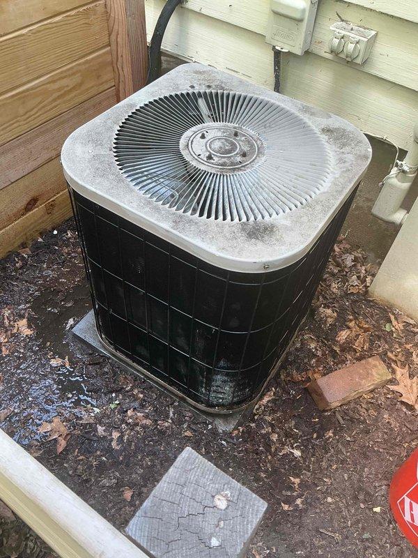 Completed comprehensive BFMA tune-up and preventative maintenance on a 26-year-old outdoor air conditioning condenser unit. Performed standard inspection protocols including cleaning of condenser coils, verification of refrigerant levels, electrical connection testing, and assessment of fan motor operation. Unit was found to be operational with normal wear consistent with age; debris was cleared from around the base and protective grille areas to ensure proper airflow.