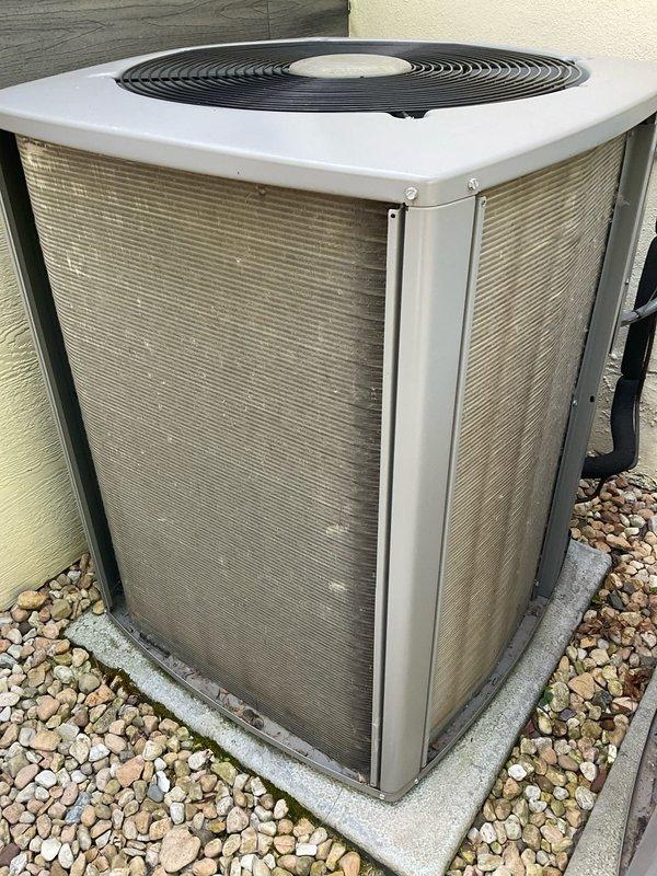 Completed comprehensive BFMA air conditioning tune-up on outdoor condenser unit. Performed standard maintenance protocol including system inspection, cleaning of condenser coils and exterior grilles, verification of proper refrigerant levels, and testing of all electrical components. Addressed thermostat firmware issues by updating system software and correcting time/date settings to restore proper programming functionality.