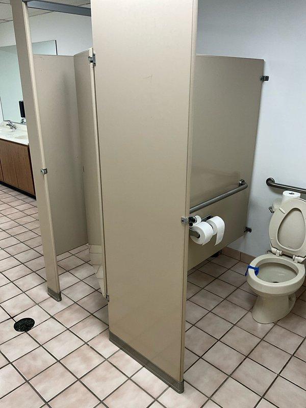 Responded to service call for toilet emitting foul odors in commercial restroom facility. Upon arrival, performed visual inspection of toilet fixture and surrounding drainage system. Based on previous service history indicating temporary improvement from rodding, conducted thorough drain line assessment to identify source of recurring odor issues.

Utilized drain auger to clear potential blockages in the toilet drain and branch line that may have been contributing to sewer gas escape. Verified proper water seal level in toilet trap to ensure adequate barrier against odor penetration. Inspected wax ring seal at toilet base and flange connection for any compromise that could allow sewer gases to enter the restroom space. All connections appeared intact with no visible signs of leakage or seal failure.

Tested drainage flow and flushing performance to confirm adequate water movement through the system. Drainage operated within normal parameters following rodding procedure. Documented cond