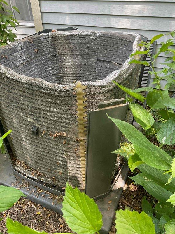 Performed comprehensive BFMA tune-up on 7+ year old residential air conditioning system. Completed full system inspection, replaced air filter, and assessed condenser unit which exhibited significant cabinet deterioration with corroded outer casing panels and exposed internal coil assembly. Noted vegetation encroachment around unit and debris accumulation on condenser fins requiring attention for optimal airflow and system efficiency.